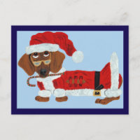 Dachshund Weihnachtsmann mit einem Zuckerrohr