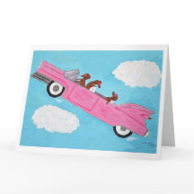 Dachshunde in einem rosa Cabrio im Himmel