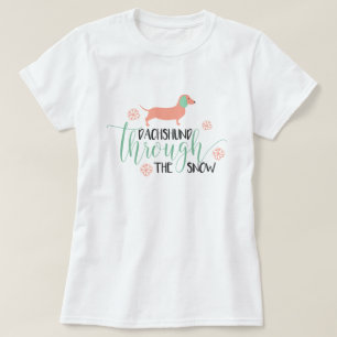 Dackel durch das Schnee-Weihnachten T-Shirt