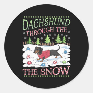 Dackel durch den Schnee Runder Aufkleber
