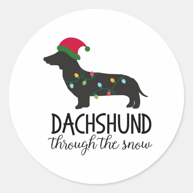 Dackel durch den Schneeaufkleber, Weihnachten Runder Aufkleber (Vorderseite)
