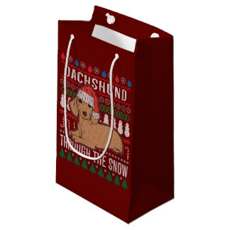 Dackel durch den schneebedeckten Weihnachtssüßer Kleine Geschenktüte