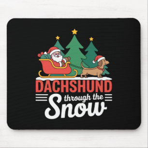 Dackel durch den schneefestlichen Weihnachtsfeiert Mousepad