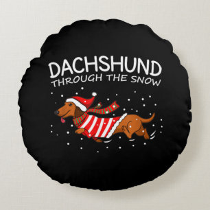 Dackel durch den schneewitzigen Hund Weihnachten Rundes Kissen