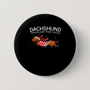 Dackel durch den schneewitzigen Hundeweihnachtskla Button
