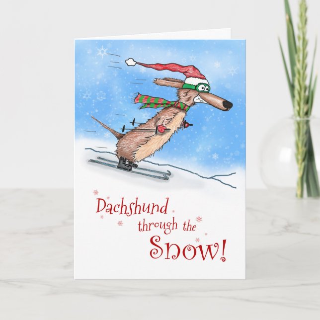 Dackel durch die schneefreudige Weihnachtszeit Feiertagskarte (Vorderseite)