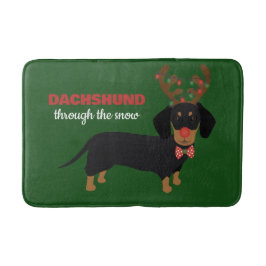 Dackel durch Schnee Niedliche Dackel Rentierhund Badematte