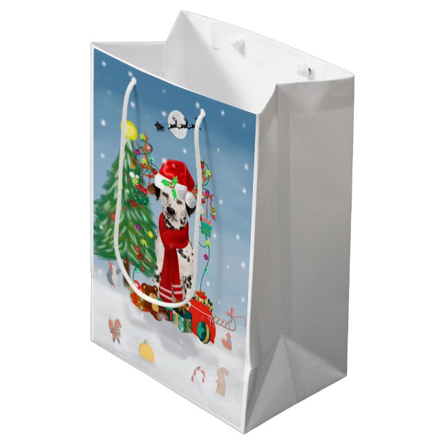 Dackel Hund im Schnee mit Weihnachtsgeschenken Mittlere Geschenktüte (Vorderseite Schrägansicht)