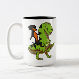 Dackel-HundeDackel, die T-Rex Dinosaurier reitet Zweifarbige Tasse