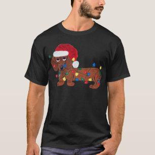 Dackel in Weihnachtslichter verheddert T-Shirt