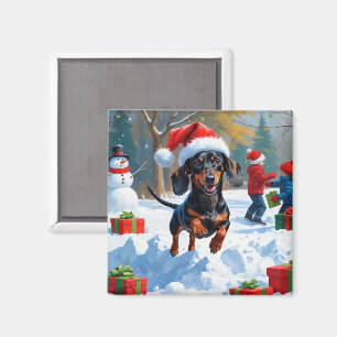 Dackel läuft im Schnee mit Weihnachtsmütze Magnet