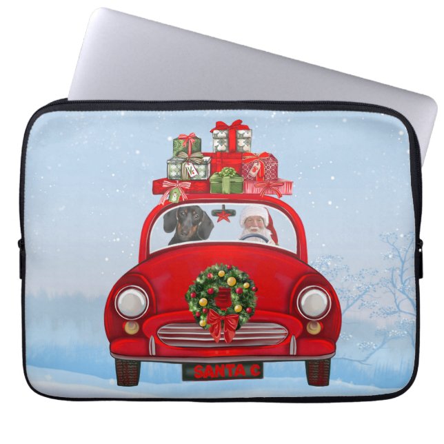 Dackel mit dem Weihnachtsmann im Auto Laptopschutzhülle (Vorderseite)