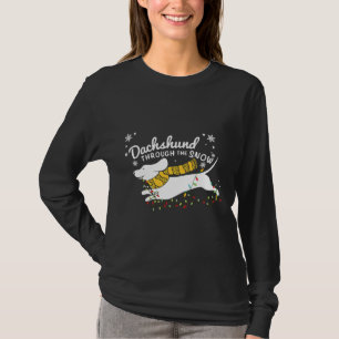 Dackel strahlt durch den Schnee T-Shirt