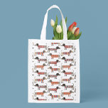 Dackel Wursthund Wiederverwendbare Einkaufstasche<br><div class="desc">Lustige kleine Dackel Würstchen oder Dackel Hunde in Wollstrickbekleidung. Ideal für Hundefreunde. Originelle Kunst von Nic Squirrell.</div>