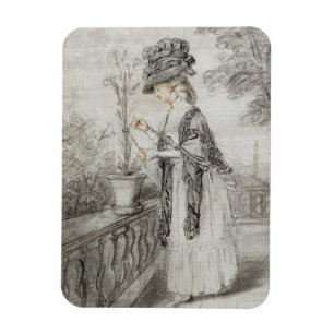 Dame auf einer Terrasse, die eine Magnet