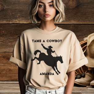 Damen-T-Shirt 'Einen Cowboy zähmen' mit Mann auf P T-Shirt