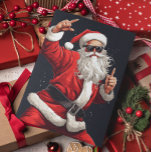 Dancing Rocker Santa Feiertagskarte<br><div class="desc">Dieses Design entstand durch digitale Kunst und kann in dem Bereich personalisiert sein, der durch das Ändern des Fotos und/oder Textes zur Verfügung gestellt wird. Oder Sie können es anpassen, indem Sie den Mausklick auswählen, um weitere Optionen anzupassen, um die Farbe des Hintergrunds zu löschen oder zu ändern, Text hinzuzufügen,...</div>