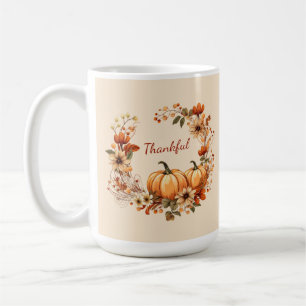 Dankenswerter Kürbis und Blume im Herbst Kaffeetasse