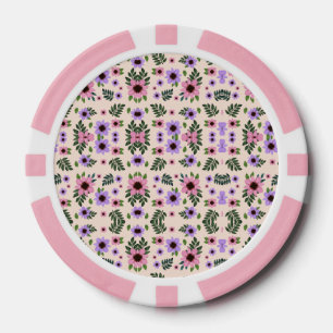 Das Bild zeigt Pokerchips mit einem Blumenmuster