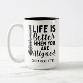 Das chiropraktische Leben ist besser, wenn sich di Zweifarbige Tasse