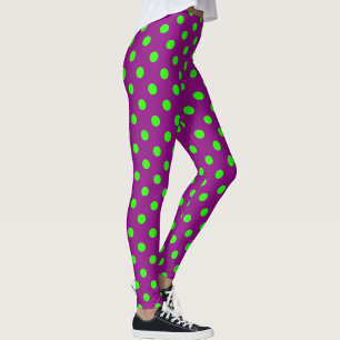 Das Design der Lila Polka-Dots ist grün Leggings