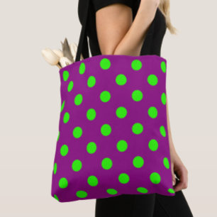 Das Design der Lila Polka-Dots ist grün Tasche
