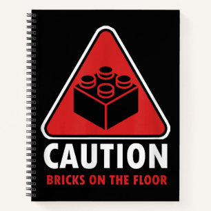 Das Gebäude "Funny Warning Caution" blockiert Stei Notizbuch