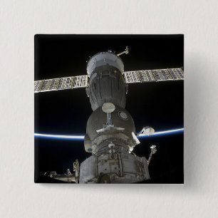 Das Glied der Erde schneidet ein Soyuz Button