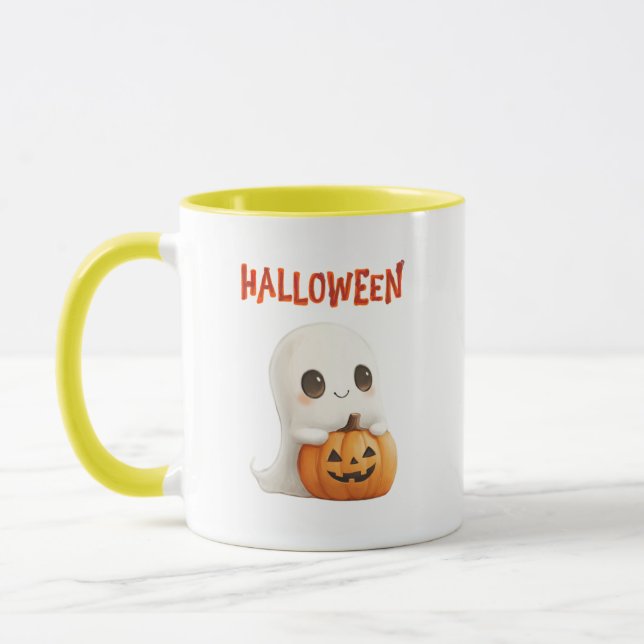 Das ist eine niedliche Tasse zu Halloween. (Links)
