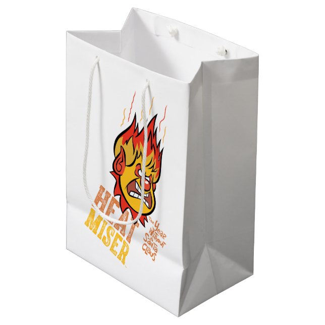DAS JAHR OHNE SANTA CLAUS™ Heat Miser Fuming Mittlere Geschenktüte (Vorderseite Schrägansicht)
