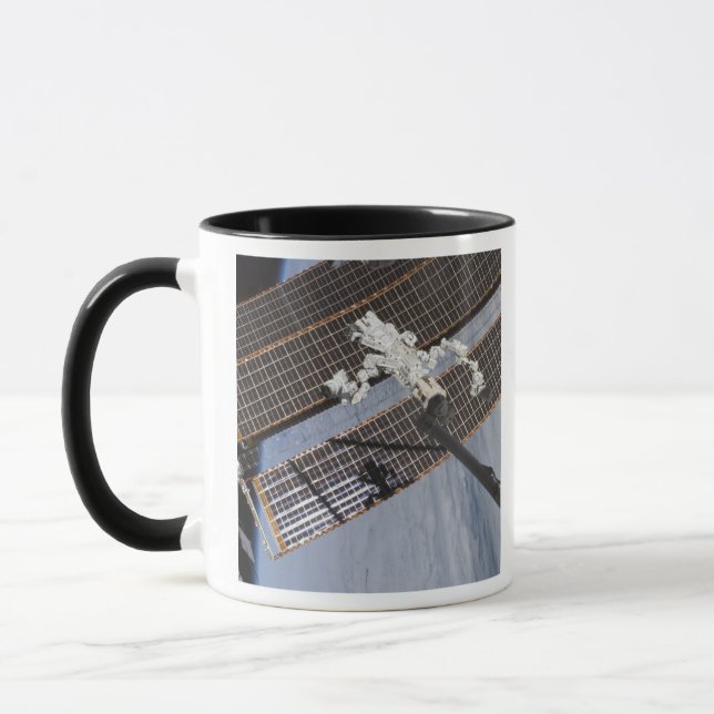 Das kanadische Dextre-Robotersystem 3 Tasse (Links)