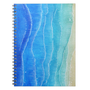 Das Meer und der Strand sind in Aquarellen gehalte Notizblock