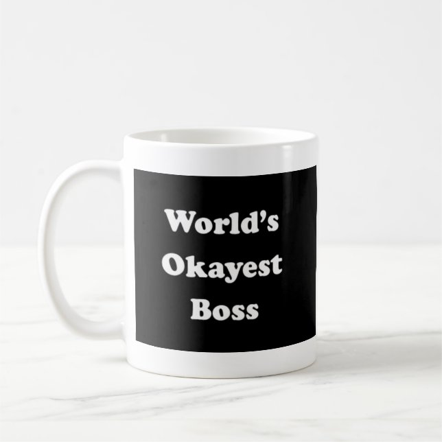 Das Okayest der Welt Chef-humorvolles Kaffeetasse (Links)