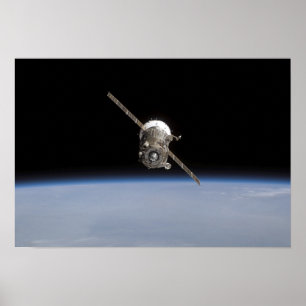 Das Soyuz TMA-11 Raumfahrzeug über dem horiz der Poster