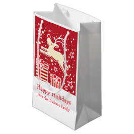 De mignons rennes dansant sur le sac cadeau de Noë