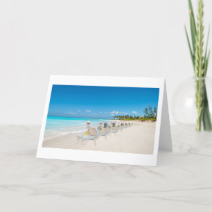 De Remerciements Queues sur une plage avec carte blanche pliée à vi
