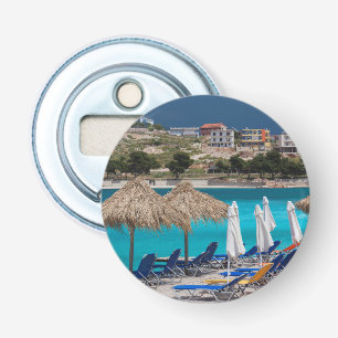 Décapsuleur Ksamil, bord de plage de la ville