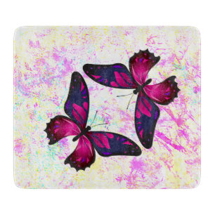 Dekorative rosa und violette bunte Schmetterlinge Schneidebrett