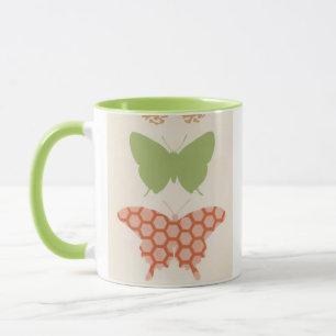 Dekorative Schmetterlings-Muster auf Tasse