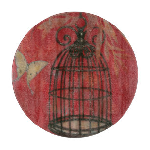 Dekorativer Birdcage mit Schmetterlingen Schneidebrett