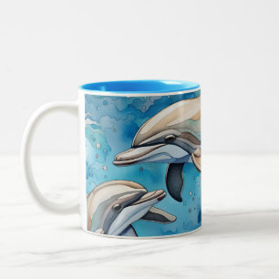 Delfine schwimmen im Meer Zweifarbige Tasse