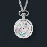 Delikate 3D-Pastel-Blume Necklace beobachten Armbanduhr<br><div class="desc">Eine charmante Mischung aus Funktionalität und Eleganz, die unsere delikate Pastel Blume 3D Watch Necklace vorstellt. Diese einzigartige Halskette besticht durch einen farbenfrohen Uhrenanhänger, der in einem faszinierenden 3D-Design mit zarten pastellfarbenen Blume geschmückt ist. Der Uhrenanhänger wurde mit viel Liebe zum Detail gestaltet und dient sowohl als stilvolles Accessoire als...</div>