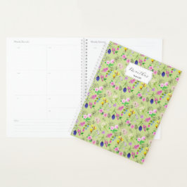 Delikate Aquarellfarben-Wildblumen auf grün Planer