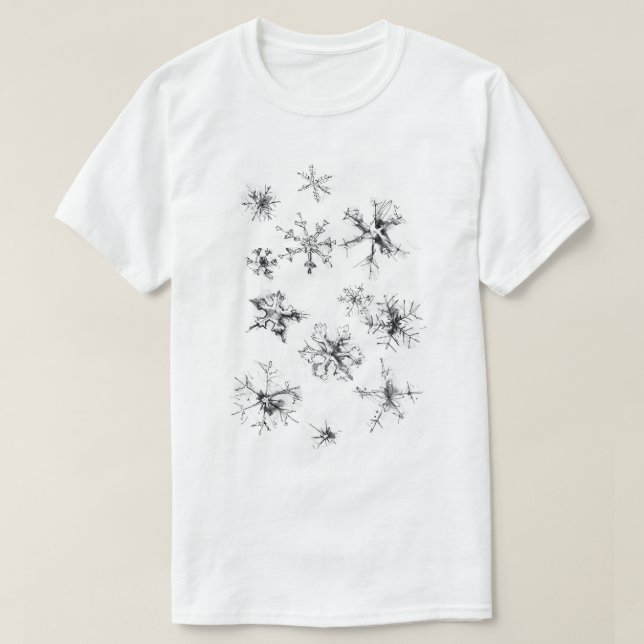 Delikate fallende Schneeflocken T-Shirt (Design vorne)