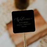Delikate Goldkalligraphie | Schwarze Hochzeit Will Quadratischer Aufkleber<br><div class="desc">Diese zarten Goldkalligraphie schwarzen Hochzeitsaufkleber sind perfekt für eine moderne Hochzeit. Das romantische minimalistische Design besticht durch eine hübsche und elegante Champagner-goldgelbe Typografie auf schwarzem Hintergrund mit einem klaren und schlichten Look. Personalisieren Sie diese Aufkleber mit dem Ort Ihrer Hochzeit, Namen und Hochzeitsdatum. Diese Labels eignen sich ideal für Hochzeiten...</div>