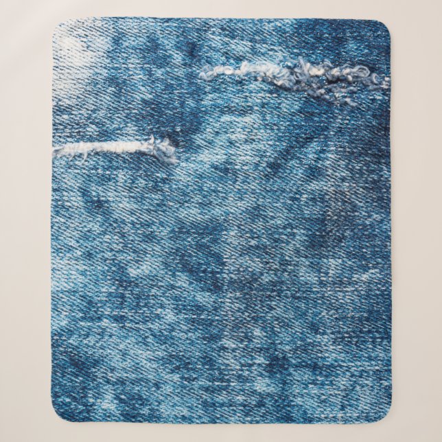 Denim texture.Blue Jeans mit Fäden und Löchern für Sherpadecke (Vorderseite)