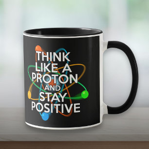 DENKE WIE EIN PROTON UND BLEIBE POSITIV TASSE