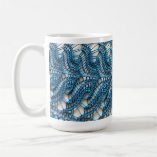 Dentelle tricotant la tasse orientée