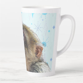Der Affe blickt auf das moderne Hintergrundbild de Milchtasse