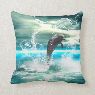Der Delphin springend in das Meer mit Wellen als Kissen